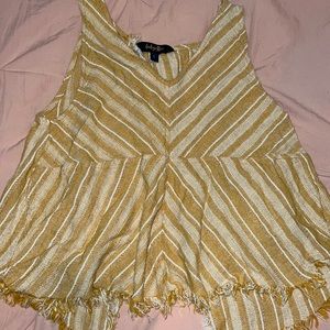 this is a cute western tank top that cuts open in the back but is not too flashy